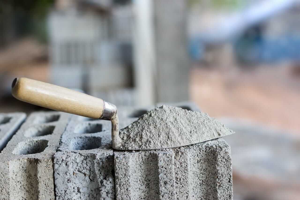 What is the difference between Portland cement and Quikrete?